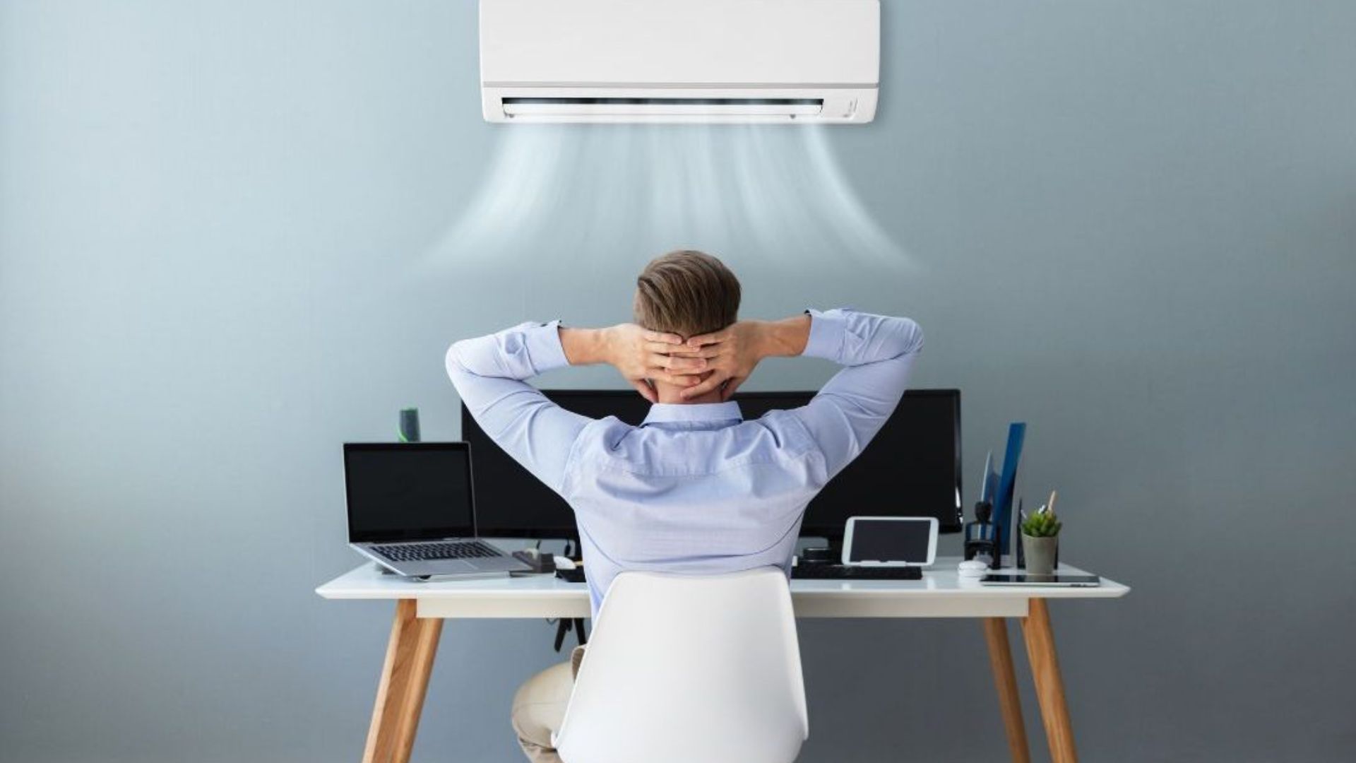 A man using AC at home in South Africa